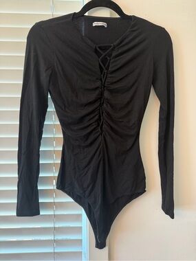 Reformation Black Stretch Bodysuit with Lace-Up Detail